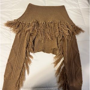 Cuteee brown sweater! Cool detailing! Brown